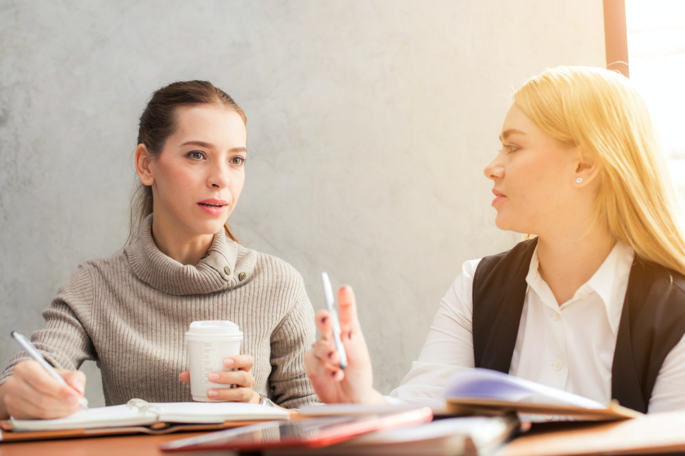 two women working