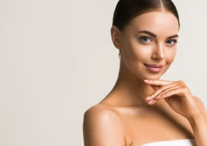 Woman with flawless skin showing results of a facelift.